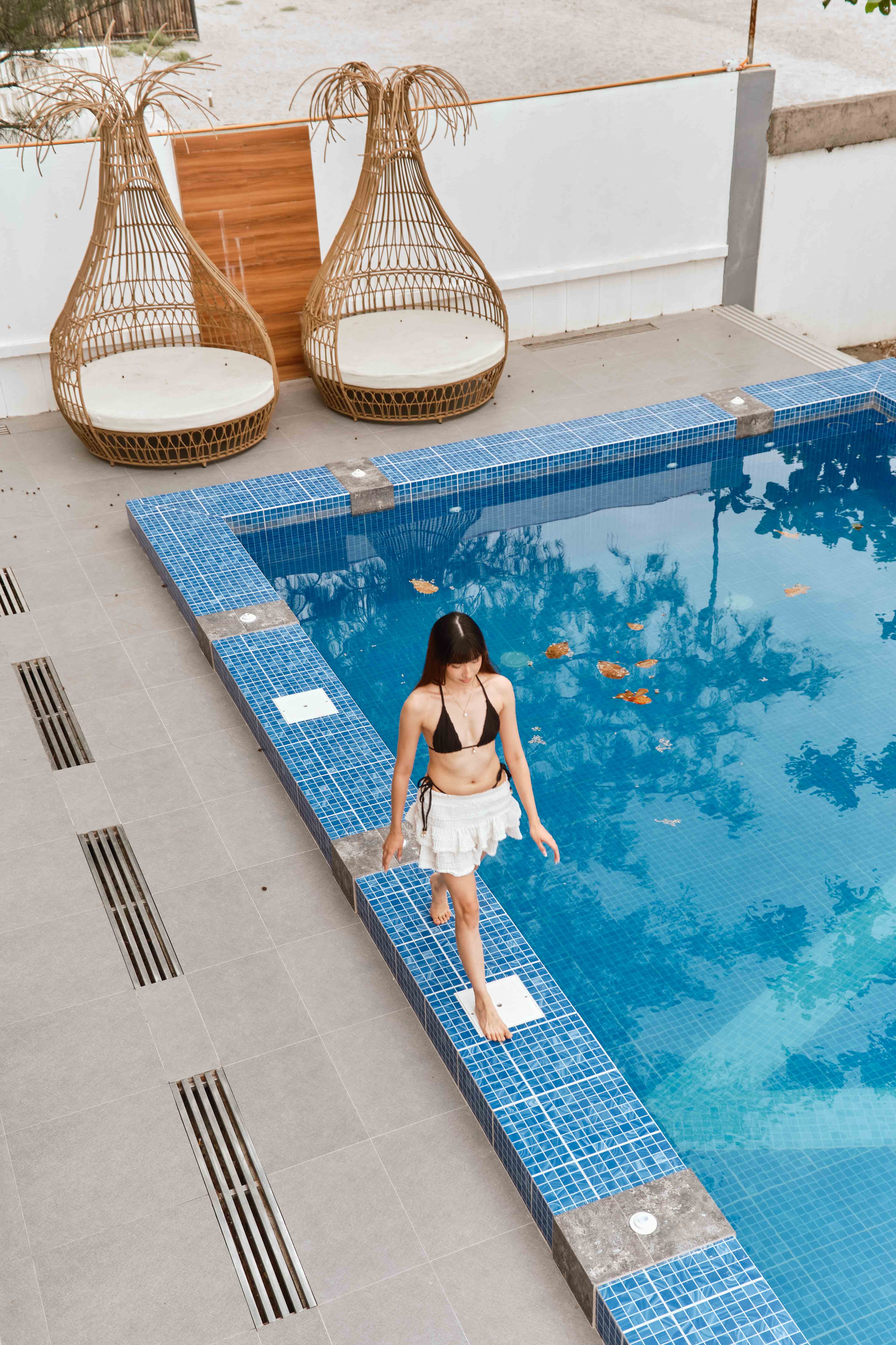 Woman walking in Pool area